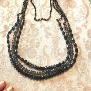 Triple Strand blue crystals on black gun metal
